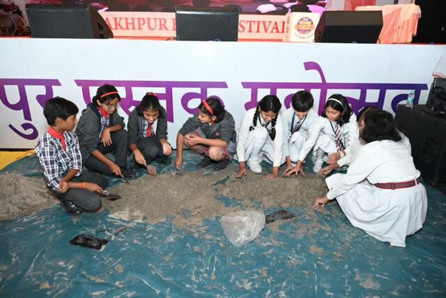 Crowd gathered at Gorakhpur Book Fair 2025 during Bal Mandap activities and cultural evening at Deen Dayal Upadhyay University.