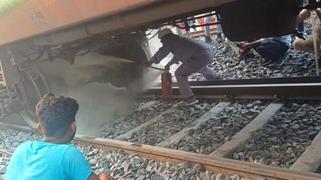 Fire breaks out in a coach of the special train at Daudpur station in Saran, Bihar; railway staff and locals work together to control the blaze and ensure passenger safety.