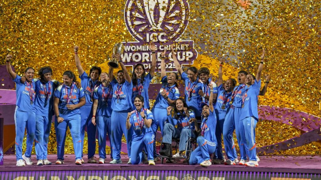 Indian women’s cricket team celebrating historic ICC Women’s World Cup 2025 victory after defeating South Africa by 52 runs in the final at DY Patil Stadium, Navi Mumbai.