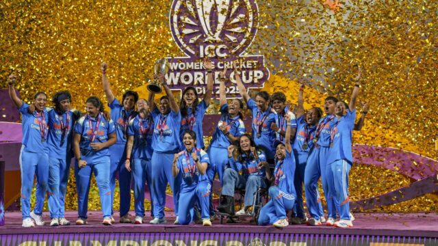 Indian women’s cricket team celebrating historic ICC Women’s World Cup 2025 victory after defeating South Africa by 52 runs in the final at DY Patil Stadium, Navi Mumbai.